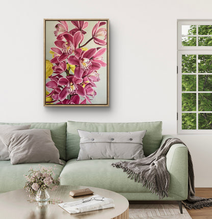 Living room with a green sofa, floral painting, and window view