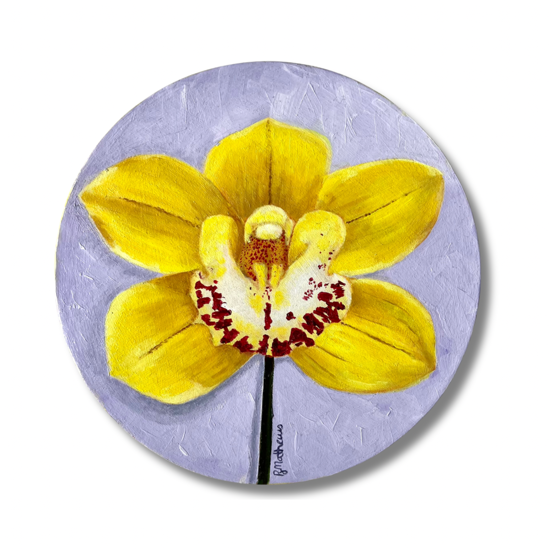 Yellow orchid flower on a purple circular background